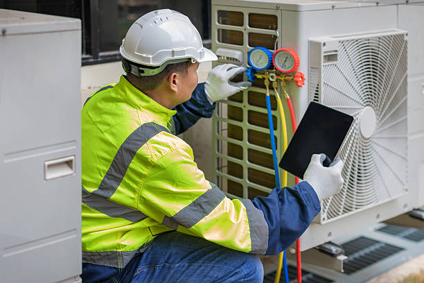 Professional Hvac technician working in Boylston, MA